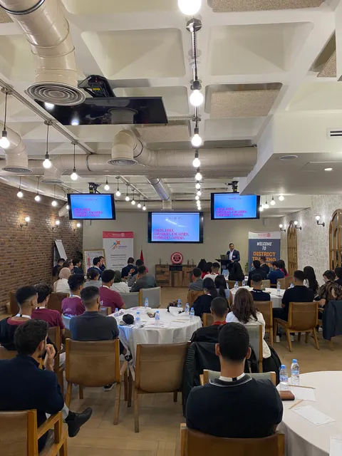 Speaker giving a tech talk in from of attendees